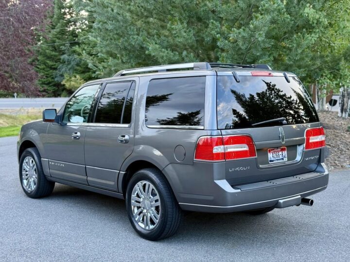 A photo showing the exterior of a 2010 Lincoln Navigator from a rear three quarters angle.