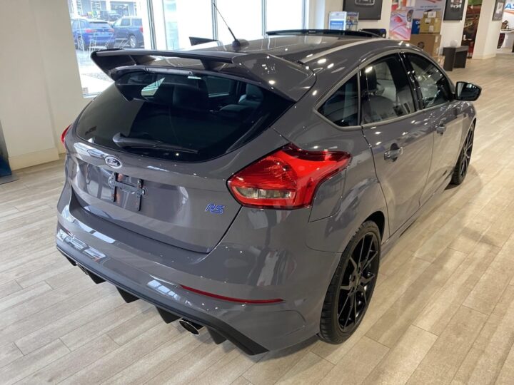 A photo showing the exterior of a 2016 Ford Focus RS from a rear three quarters angle.