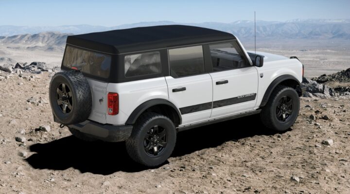 Photo of the 2025 Ford Bronco with the Black Diamond Graphics Package, shown from a rear three-quarters angle. The optional bundle is available on Black Diamond Package equipped models. 