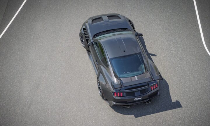 Photo of the 2025 Ford Mustang GTD Carbon Series trim level, shown from a high rear three-quarters angle. This trim adds several new carbon fiber components.
