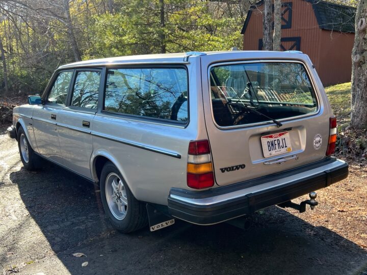 A photo showing the exterior of a Ford 5.0L V8 powered 1982 Volvo 245 GL wagon from a rear three quarters angle.
