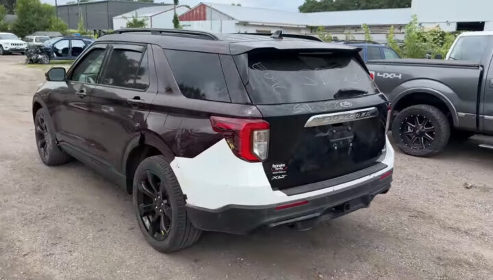 Video still of the Ford Explorer ST after undergoing extensive repairs, receiving a rear section from a different vehicle. 