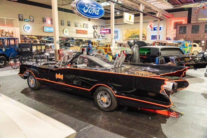 A photo showing the exterior of a 1966 Batmobile replica from a rear three quarters angle.