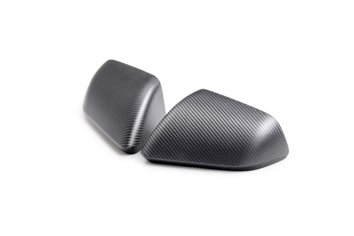 A photo showing the S650 Ford Mustang carbon fiber mirror caps in a matte finish.