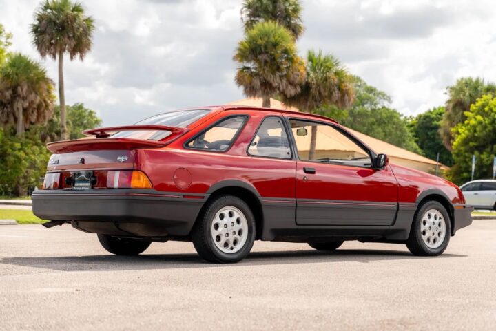 A photo showing the exterior of a 1985 Merkur XR4Ti from a rear three quarters angle.