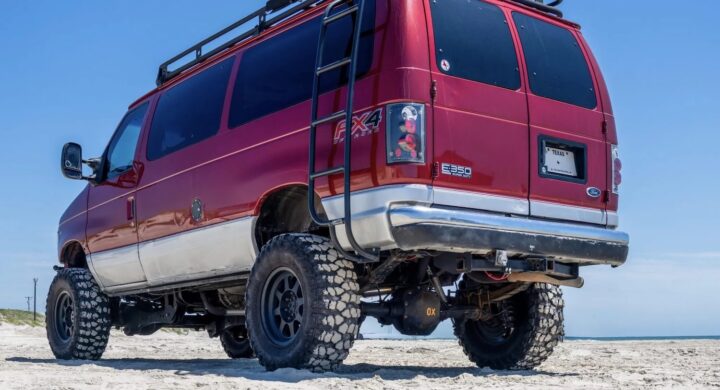 A photo showing the exterior of a 2000 Ford E-350 from a rear three quarters angle.