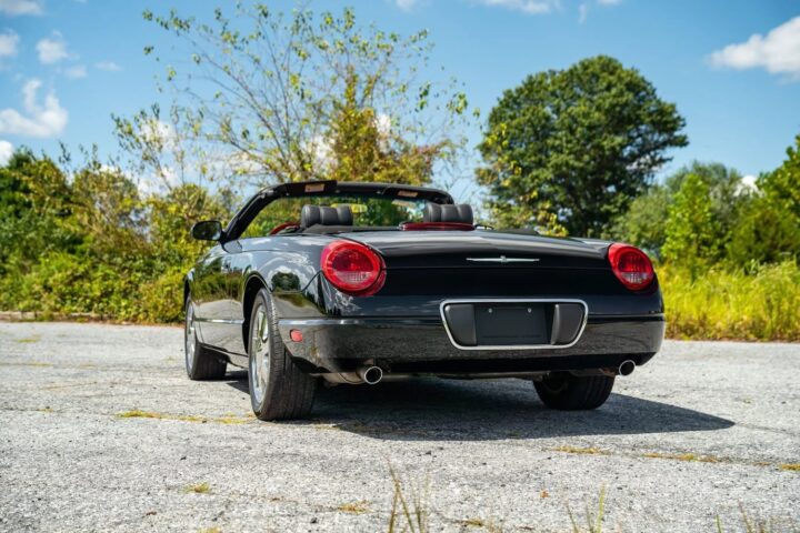 A photo showing the exterior of a 2002 Ford Thunderbird from a rear three quarters angle.