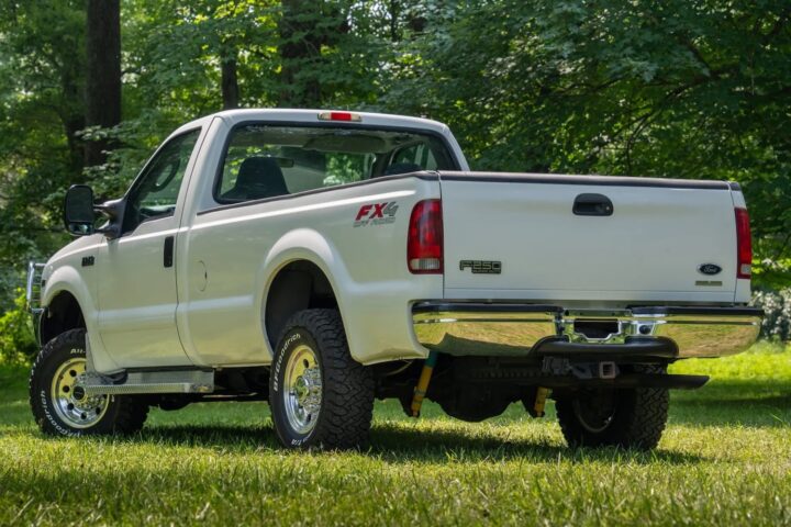 A photo showing the exterior of a 2003 Ford F-250 Super Duty from a rear three quarters angle.