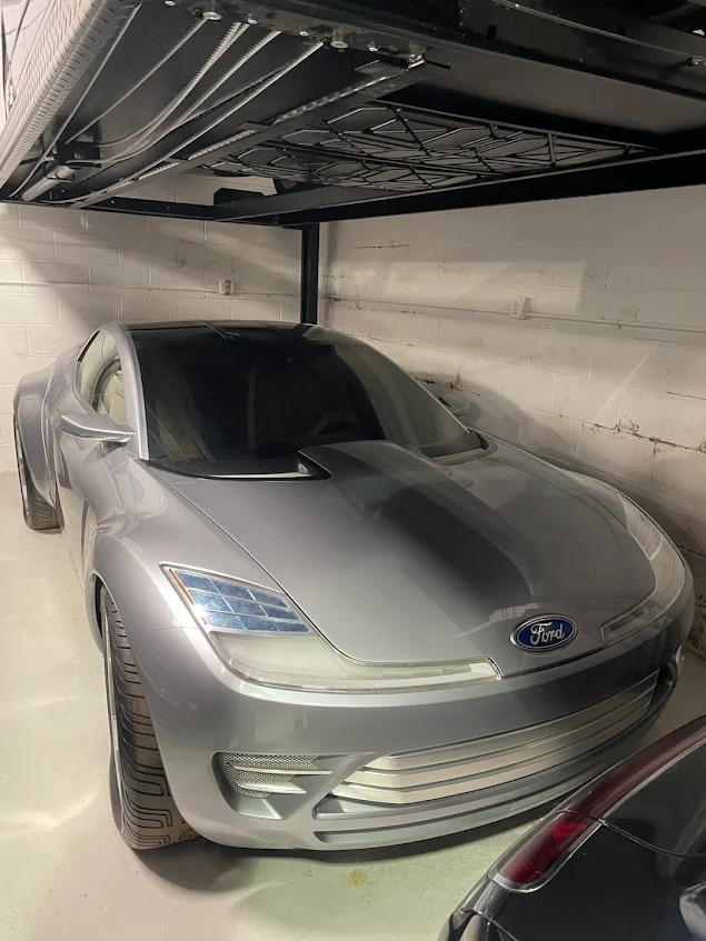 A photo of the 2006 Ford Reflex concept parked in the Ford U.S. Heritage Fleet, shown from a front three-quarters angle. This vehicle is one of many concepts currently included in the collection.