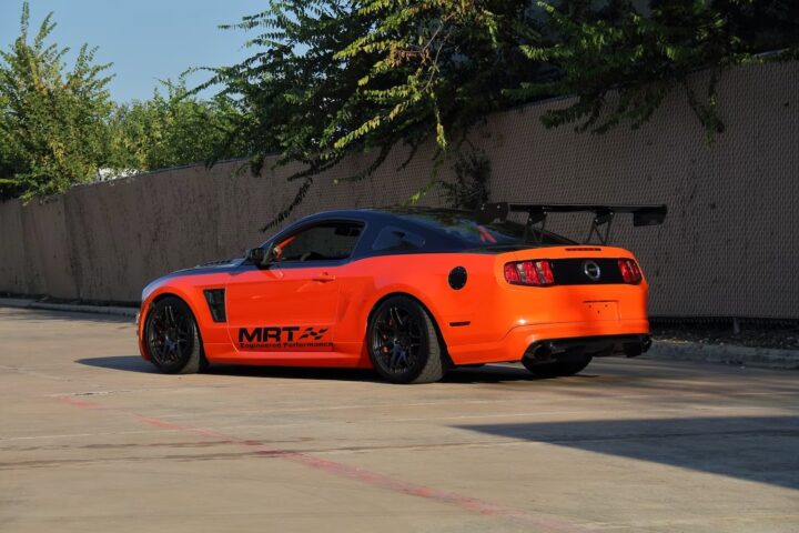 A photo showing the exterior of a 2012 Ford Mustang from a rear three quarters angle.