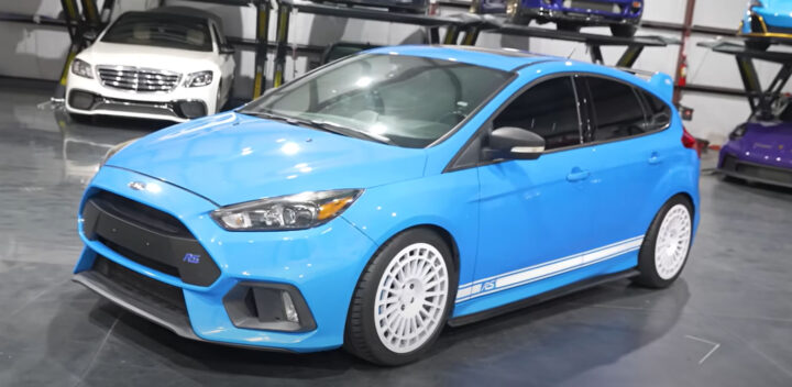 Video still of the 2016 Ford Focus RS owned by Tavarish, shown from a front three-quarters angle. It experienced an engine issue due to shoddy prior work. 