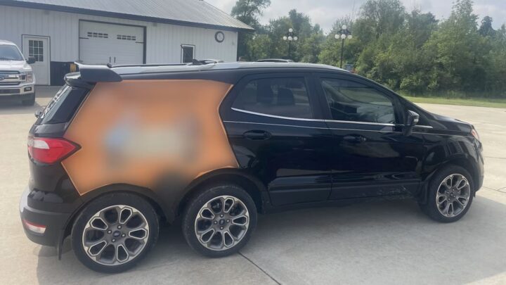A photo showing the exterior of a 2019 Ford EcoSport with six wheels from a rear three quarters angle.