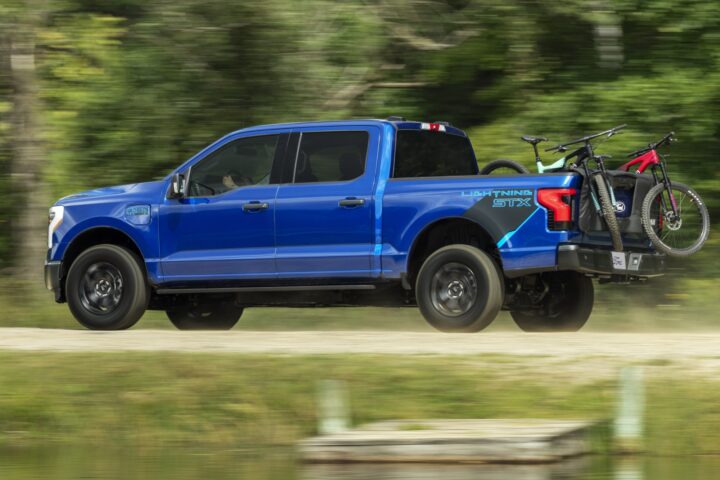 Photo of the 2026 Ford F-150 Lightning, shown from a side view. The extended range battery option is now standard across the lineup.
