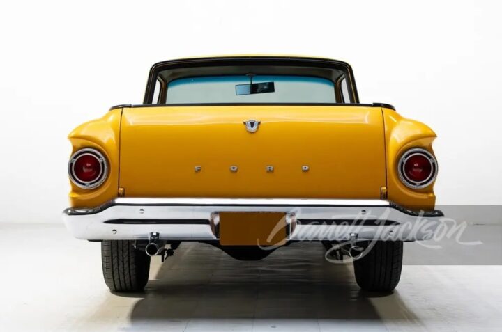 A photo showing the exterior of a 1960 Ford Ranchero restomod from a rear angle.