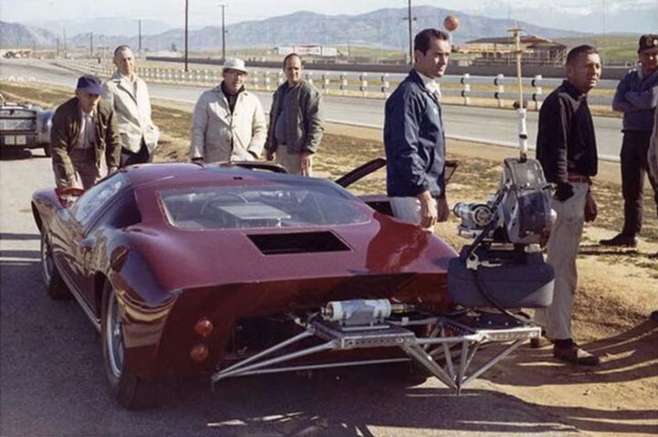 A photo showing the exterior of a 1965 Ford GT40 Mk1 from a rear three quarters angle.