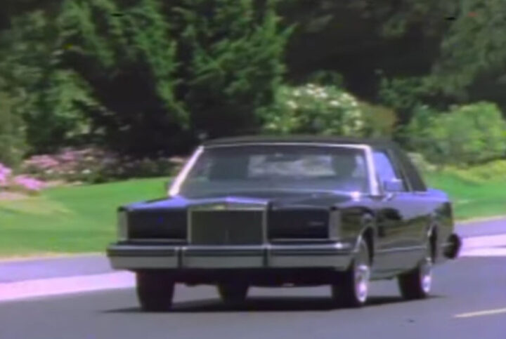 Video still of the vintage 1982 Lincoln Mark VI review, which indicated that it was a better value than the Cadillac Eldorado of the same era. 