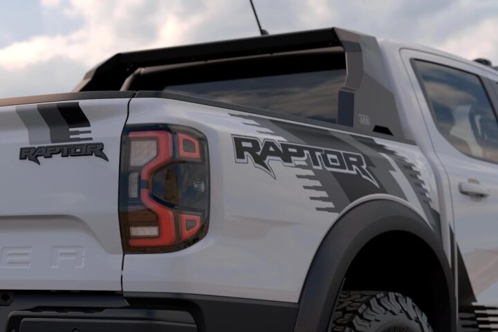 A photo showing the exterior of the 2026 Ford Ranger Raptor Desert Pack from a rear three quarters angle.