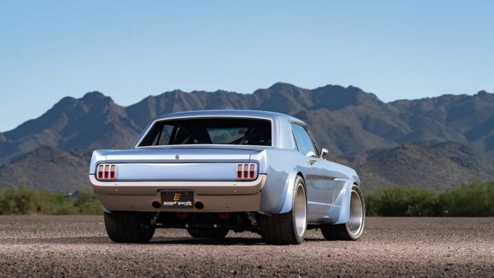 A photo showing the exterior of a 1966 Ford Mustang from a rear three quarters angle.