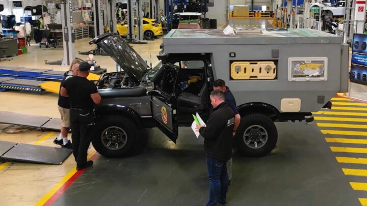A photo showing the exterior of a modified 1991 Ford Bronco from a side angle.