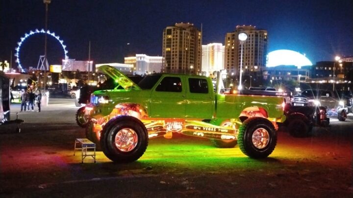 A photo showing the exterior of a 1994 Ford F-350 SEMA build from a side angle.